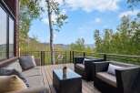Enjoy breathtaking mountain views from this expansive deck, perfect for outdoor entertaining.