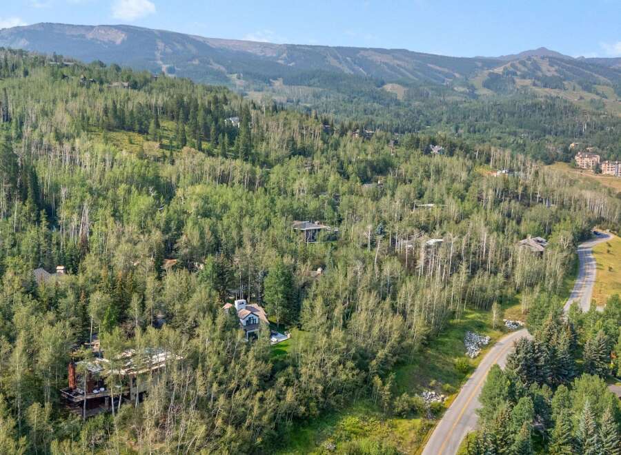 Nestled amidst a lush forest, this property offers a serene mountain retreat with stunning natural beauty.