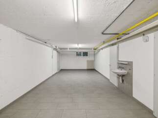 Discover this spacious and well-lit basement area, perfect for storage or as a workshop.