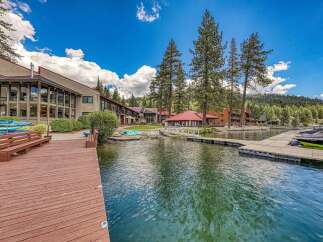 Experience lakeside living at its finest with this stunning property featuring a private dock and direct water access.
