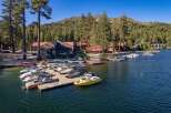 Experience lakeside living with this stunning property featuring a private marina and ample boat dockage.