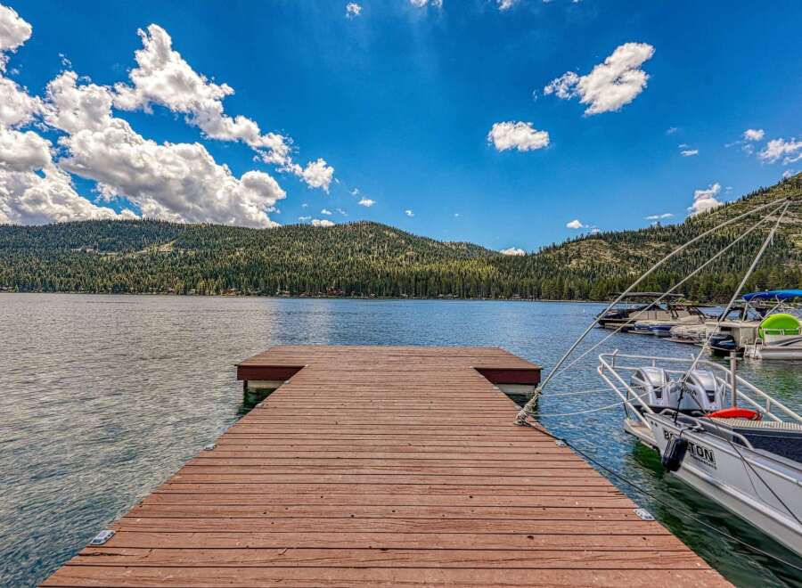Experience lakeside living with this stunning property featuring a private dock perfect for your boats.