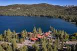 Experience the ultimate lakeside living with this stunning property offering direct access to a pristine blue lake.