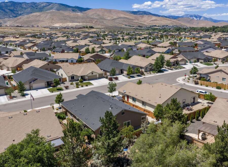 Discover this stunning suburban neighborhood with a backdrop of majestic mountains.