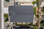 Discover this stunning property featuring a spacious, dark gray asphalt shingle roof, perfect for any home.
