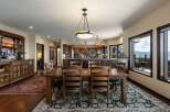 Experience breathtaking lake views from this stunning dining area, perfect for entertaining.
