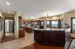 Experience breathtaking lake views from this stunning kitchen and dining area, perfect for entertaining.