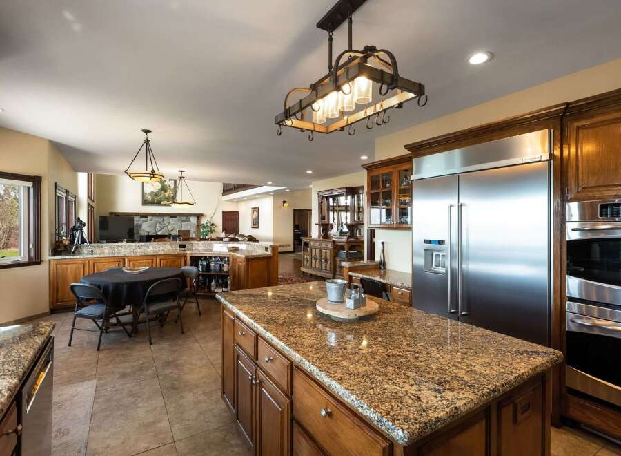 Experience luxury living in this expansive open-concept kitchen and dining area, perfect for entertaining.