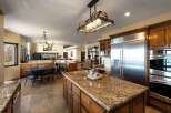 Experience luxury living in this expansive open-concept kitchen and dining area, perfect for entertaining.