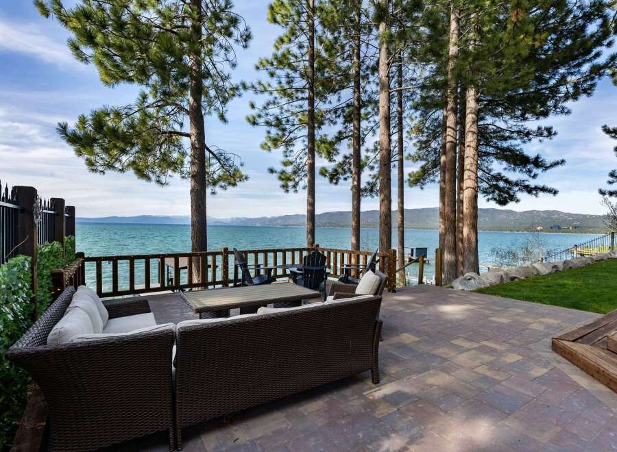 Enjoy breathtaking lake views from this stunning patio, perfect for outdoor entertaining.