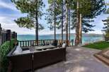 Enjoy breathtaking lake views from this stunning patio, perfect for outdoor entertaining.