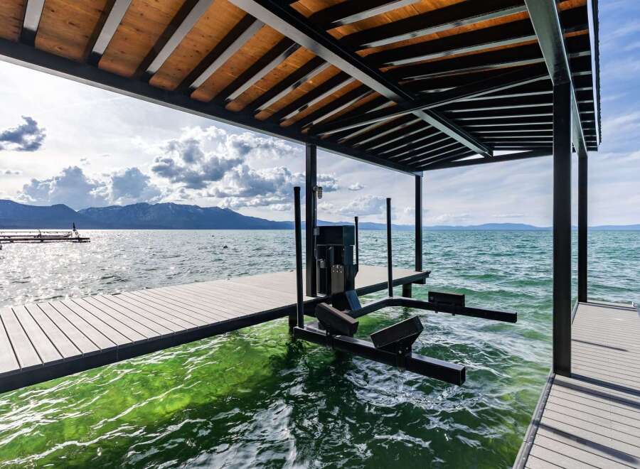 Experience waterfront living at its finest with this stunning property featuring a private dock and boat lift.