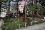 Experience serene lakeside living in this stunning property, nestled amongst mature trees with breathtaking water views.