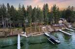 Experience luxury lakeside living with this stunning property featuring multiple private docks and boat lifts, perfect for water enthusiasts.