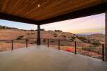 Enjoy breathtaking sunset views from this expansive covered patio, perfect for outdoor entertaining.