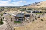 Discover modern luxury living in this stunning home nestled in a picturesque hillside community.