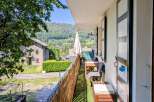 Enjoy breathtaking mountain views from this charming balcony, perfect for your morning coffee or evening relaxation.