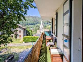 Enjoy breathtaking mountain views from this charming balcony, perfect for your morning coffee or evening relaxation.