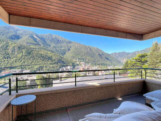 Experience breathtaking mountain views from this stunning balcony, perfect for enjoying your morning coffee or evening relaxation.