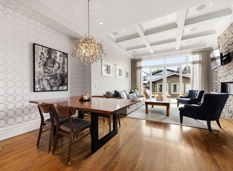 Experience elegant open-concept living in this stunning dining and living area.
