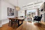 Experience elegant open-concept living in this stunning dining and living area.