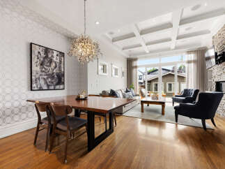 Experience elegant open-concept living in this stunning dining and living area.
