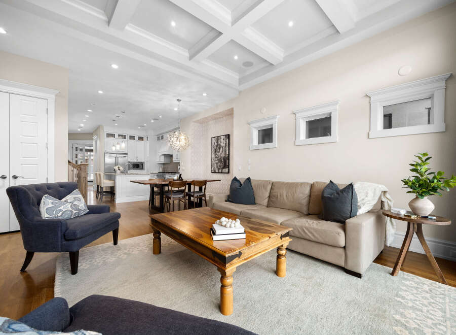 Experience luxury living in this stunning open-concept home, featuring a beautifully appointed kitchen with modern appliances and a spacious dining area perfect for entertaining.