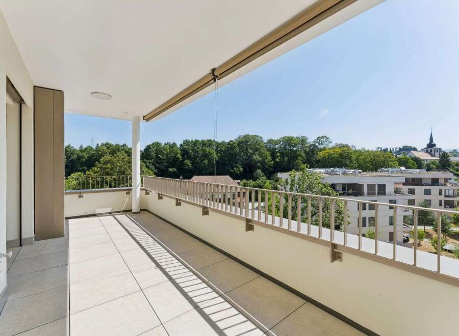 Enjoy the outdoors from this spacious balcony, perfect for relaxing or entertaining.