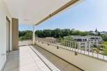 Enjoy the outdoors from this spacious balcony, perfect for relaxing or entertaining.