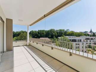 Enjoy the outdoors from this spacious balcony, perfect for relaxing or entertaining.