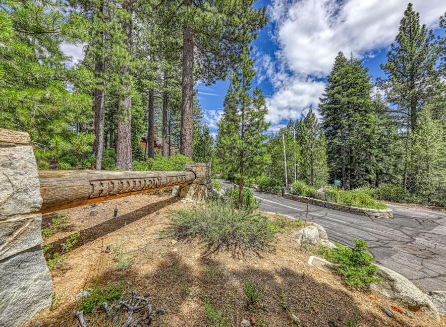 Discover this stunning property nestled within a serene, wooded landscape, offering privacy and natural beauty.