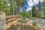 Discover this stunning property nestled within a serene, wooded landscape, offering privacy and natural beauty.