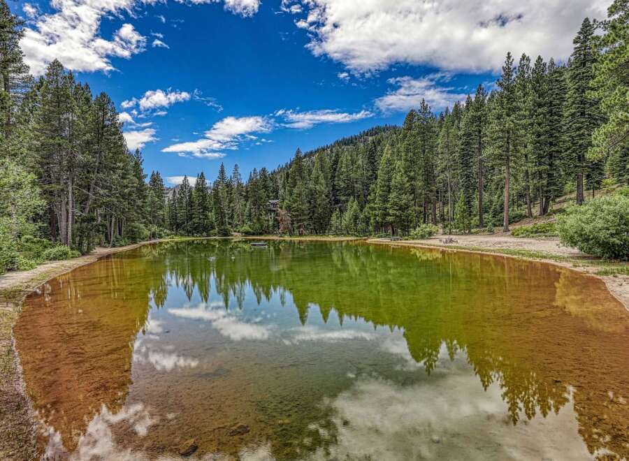 Discover a serene oasis with this stunning natural hot spring, perfect for relaxation and rejuvenation.