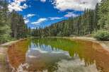 Discover a serene oasis with this stunning natural hot spring, perfect for relaxation and rejuvenation.