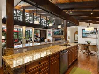 Experience the perfect blend of rustic charm and modern luxury in this stunning mountain home.