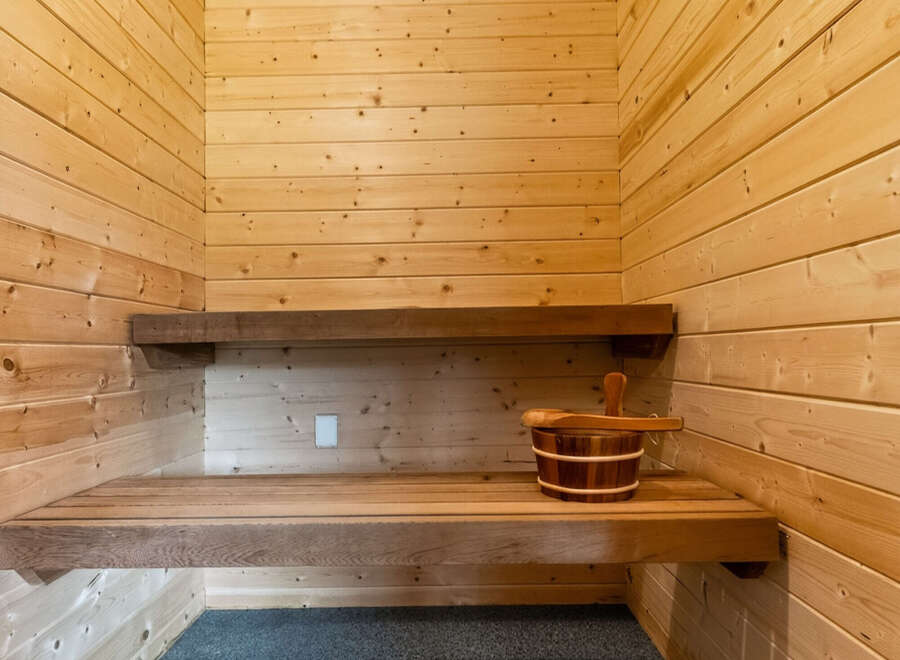 Experience ultimate relaxation in this beautifully crafted wooden sauna.