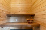 Experience ultimate relaxation in this beautifully crafted wooden sauna.