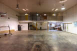 Discover this expansive garage space, perfect for hobbies and storage.