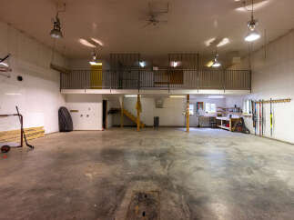 Discover this expansive garage space, perfect for hobbies and storage.