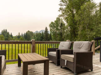 Enjoy breathtaking mountain views from this stunning deck, perfect for outdoor entertaining or quiet relaxation.