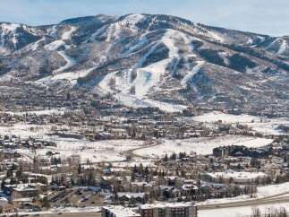 Experience the ultimate mountain lifestyle with this stunning property offering breathtaking views of snow-capped peaks and ski slopes.