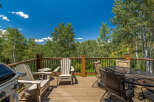 Enjoy the stunning mountain views from this spacious deck, perfect for outdoor entertaining.