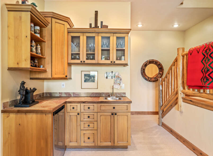 Discover this charming rustic bar area, perfect for entertaining.