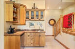 Discover this charming rustic bar area, perfect for entertaining.