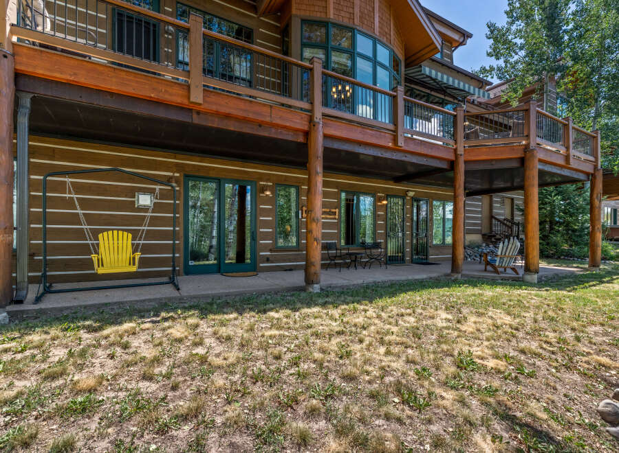 Experience rustic charm and outdoor living with this stunning log home.
