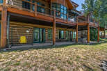 Experience rustic charm and outdoor living with this stunning log home.