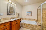 Indulge in relaxation in this luxurious bathroom featuring a spacious soaking tub, perfect for unwinding after a long day.