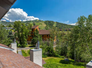 Experience breathtaking mountain views from this stunning property, perfect for outdoor enthusiasts.