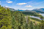 Discover breathtaking mountain views and serene lakefront living in this stunning property.