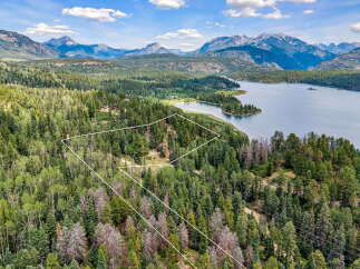 Discover this stunning property offering breathtaking mountain and lake views.
